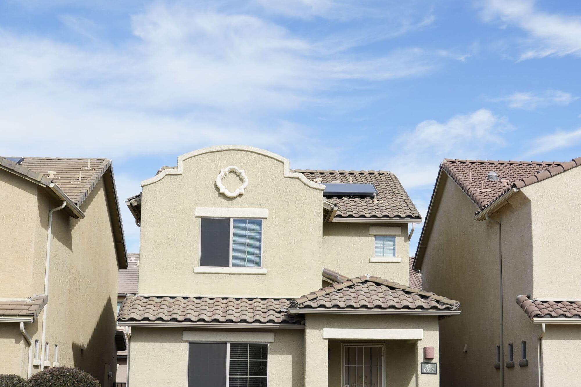 Stucco homes in a Southwest neighborhood on a clear day